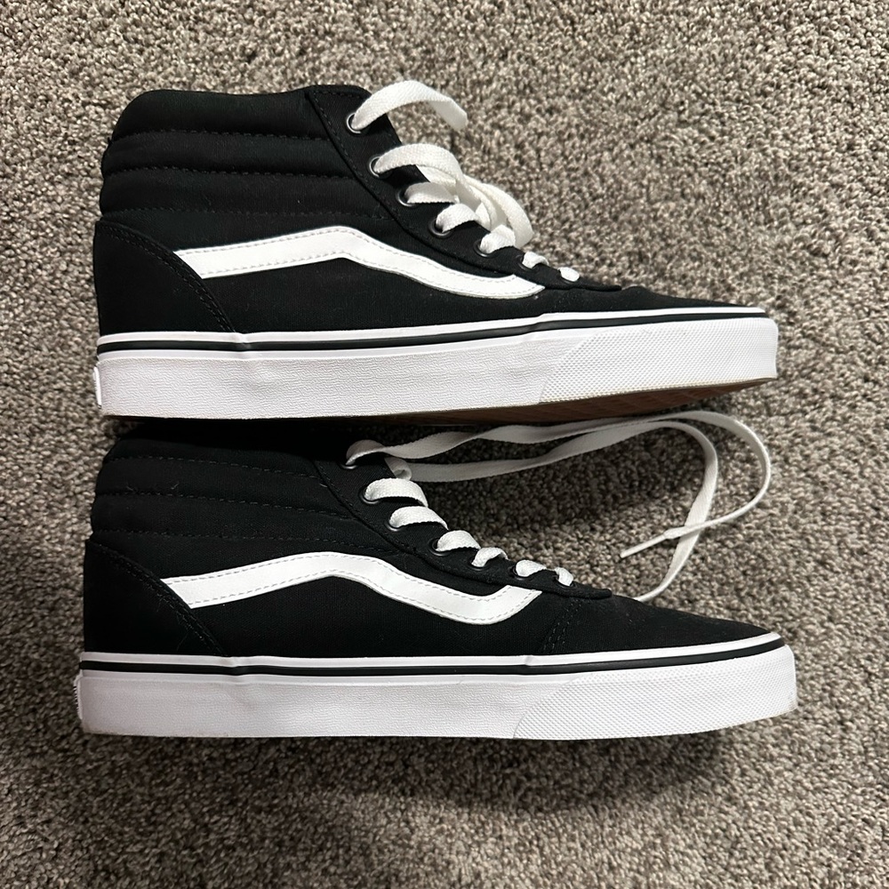Women’s black high top vans